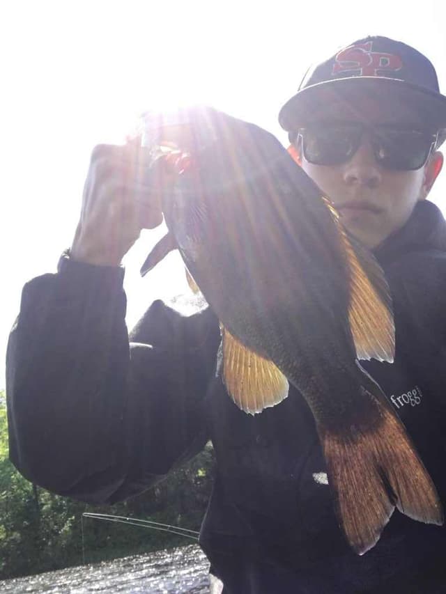 A young Hayakawa with a fish